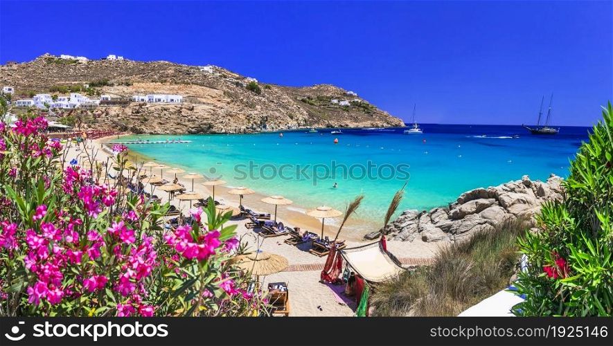 Greece summer vacation. Luxury greek holidays. Stunning Mykonos island. famous Super Paradise beach with turquoise sea