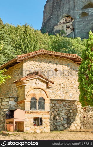 Greek church and monastery in the cliff in Meteora near Kastraki village, Greece