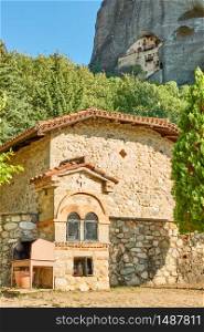 Greek church and monastery in the cliff in Meteora near Kastraki village, Greece