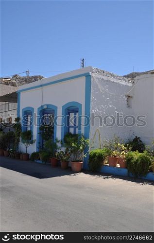 greek house with lovely flowers in Kalymnos island, Greece