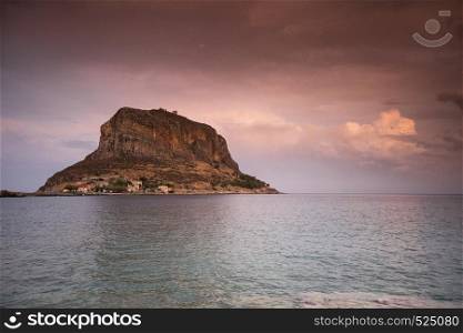 Greek island Monemvasia at evening time, Greece, east coast of the Peloponnese, Lakonia. Travel destinations.. Monemvasia island at evening, Greece