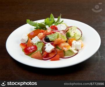 Greek Mediterranean salad with feta cheese, olives and peppers