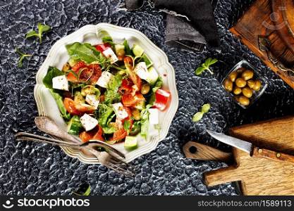 greek salad on metal plate, salad with feta cheese