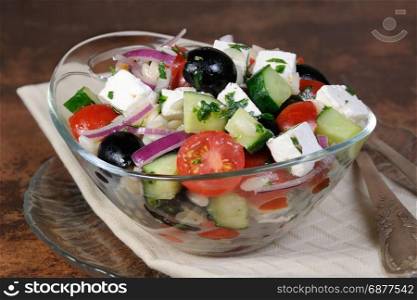 greek salad orzo pasta with black olive, red onion and cucumber, cherry tomatoes, feta and herbs