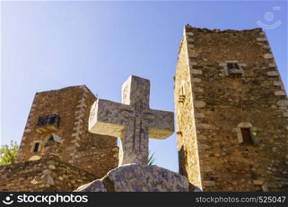 Greek stone cross and tower house, greek architecture, Vathia Mani Greece. Greek stone cross and tower house, Greece