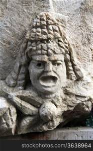 Greek theater mask on the stone in Myra, Turkey