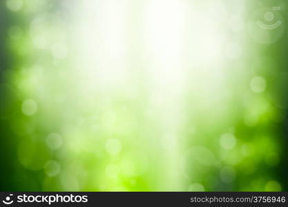 Green abstract background with bokeh and sun rays