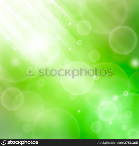 Green abstract spring background with bokeh and sunburst