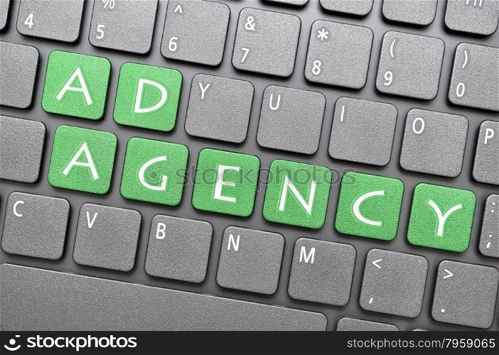 Green ad agency key on keyboard
