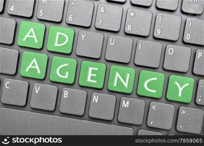 Green ad agency key on keyboard