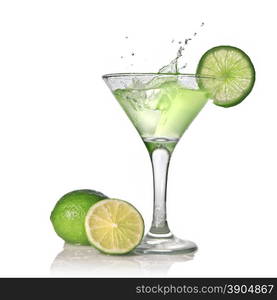 Green alcohol cocktail with splash and green lime isolated on white