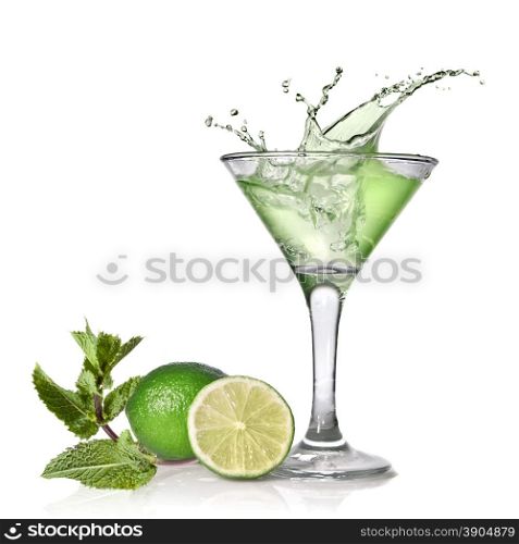 Green alcohol cocktail with splash, lime and mint isolated on white