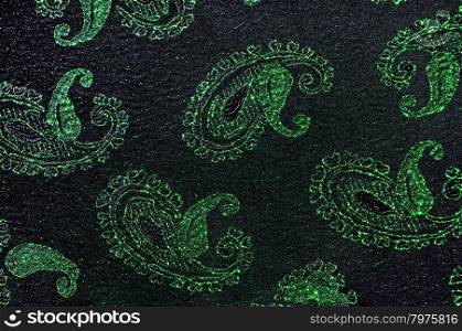 Green and black floral fabric background