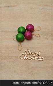 Green and Pink baubles with merry Christmas