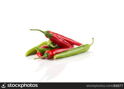Green and red chili pepper isolated on white background