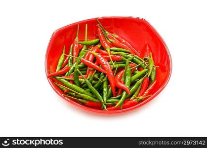 Green and red chili peppers isolated on white