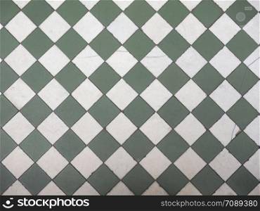 green and white tiles floor useful as a background. green and white tiled floor