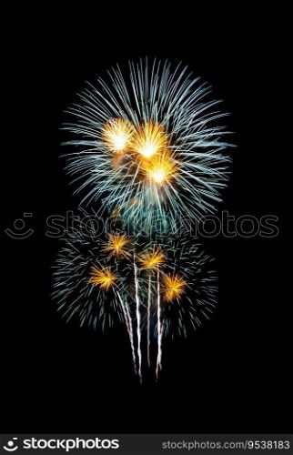Green and yellow fireworks isolated on black background for celebration and anniversary
