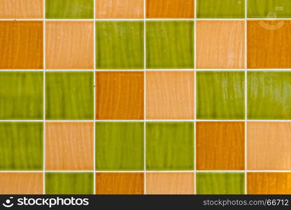 Green and yellow square tiles with white filling.