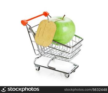 green apple with tag in shopping carts isolated on white background