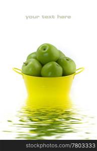 Green apples on a white background with soft focus reflected in the water. With sample text