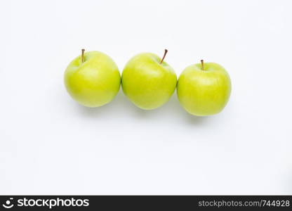 Green apples on white background. Copy space