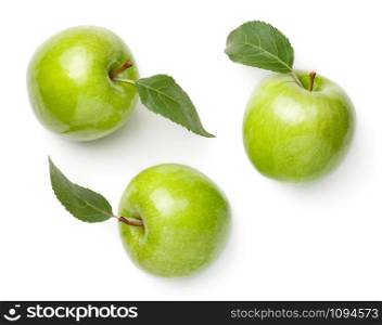 Green apples with leaves isolated on white background. Fresh granny smith apple. Top view, flat lay