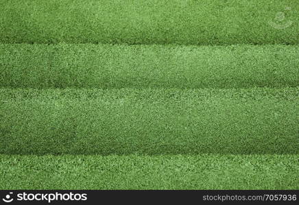 Green artificial grass texture background