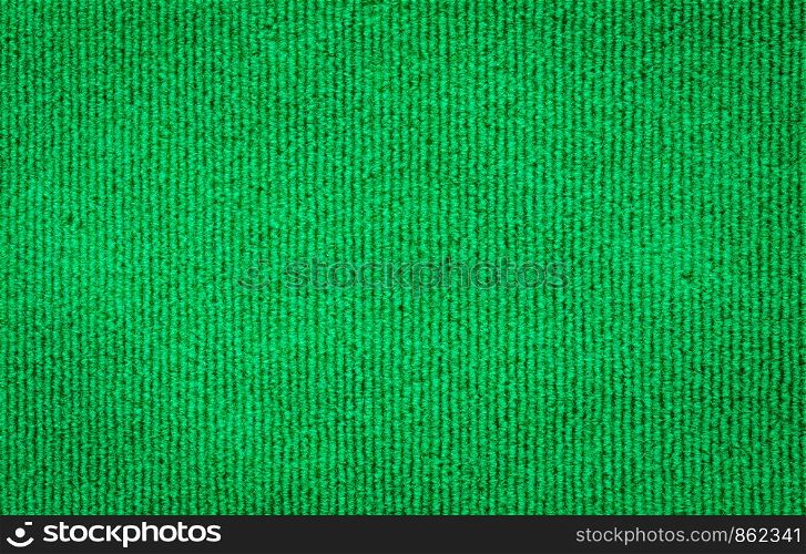 Green background of velvet fabric texture surface