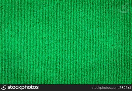 Green background of velvet fabric texture surface