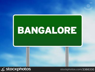 Green Bangalore raod sign on Cloud Background.