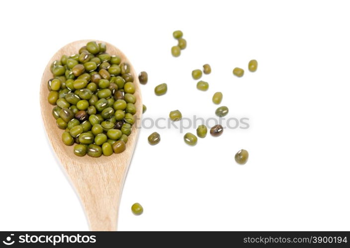 Green beans and wooden spoon isolated on the white
