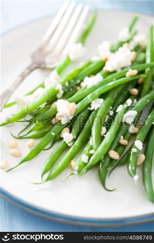 green beans salad with goat cheese and pine nuts