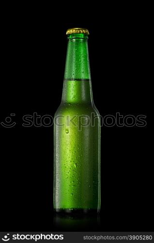 Green beer bottle with water drops isolated on black