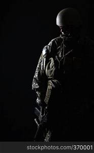 Green Berets US Army Special Forces Group soldier studio shot. US Army Green Beret