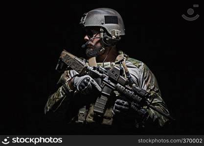 Green Berets US Army Special Forces Group soldier studio shot. US Army Green Beret