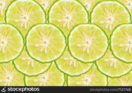 Green bergamot slices for a background.