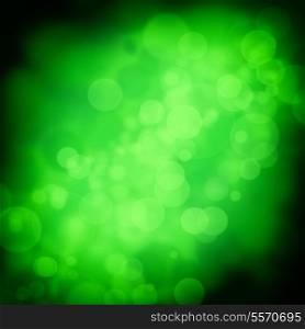 Green blur background for design with black vignette