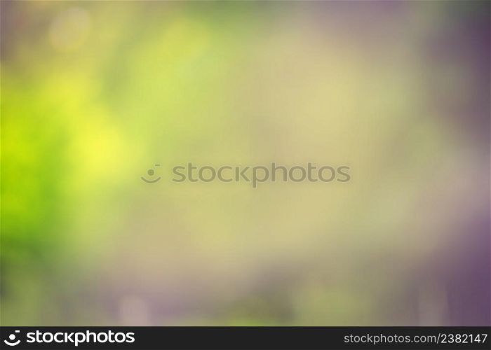 Green blurred background. Green bokeh out of focus foliage background. Fresh green bio abstract blurred background.. Spring or summer abstract nature background
