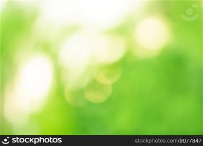 Green blurred bokeh out of focus background. Green abstract blurry backdrop image.. Green defocused surface with bokeh. Blur abstract green background.