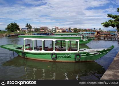 Green boat on the river in Hoi An in Vietnam