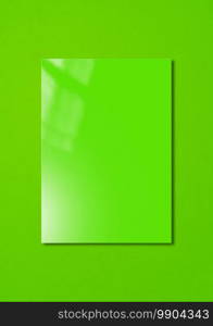 Green booklet cover isolated on colorful background, mockup template.  Green Booklet cover template on colorful background