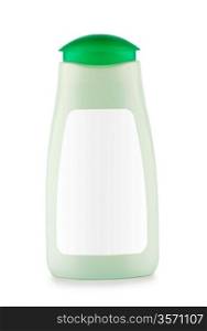 green bottle of shampoo isolated