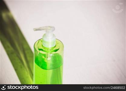 green bottle with soap