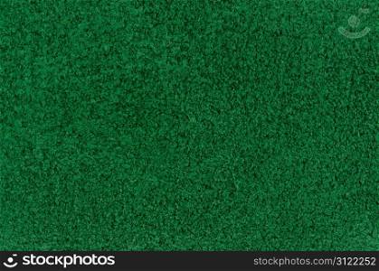 Green carpet background or texture closeup.