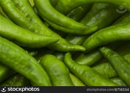 Green cayenne chili pepper, background