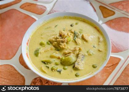 Green Chicken Curry in bowl on wooden background ,Thai cuisine