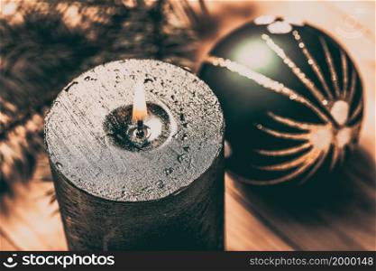 green Christmas candle burning hygge concept