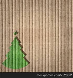 Green christmas tree on recycling paper. Environment friendly card concept