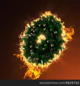 green christmas wreath with decorations in fire